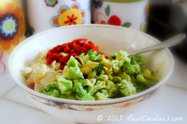 Bowl of broccoli and cheese_artichoke hearts_ red bell peppers_ Theresa Huse 2013