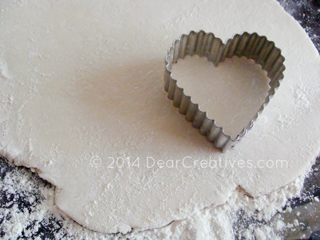 Heart cookie cutter on salt dough