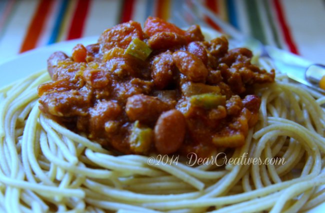 Chili on a bed of whole wheat noodles_