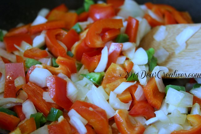 Chopped red bell peppers onions and jalapeno_