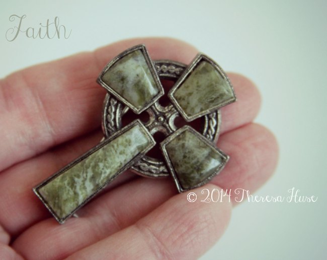 Cross being held in a hand_faith_