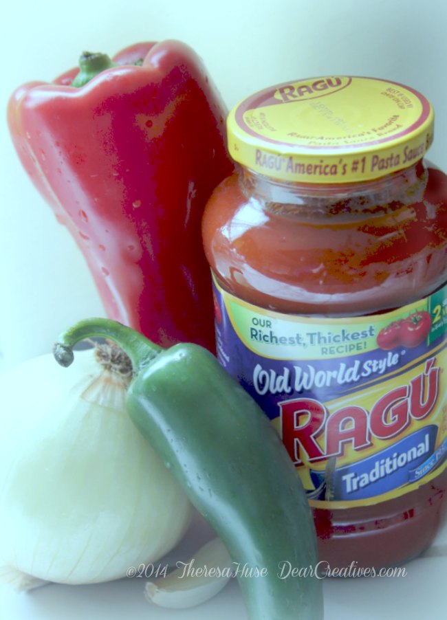 onion-red bell pepper-jalapeno-garlic and jar of Ragu sauce_