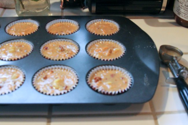 cupcake pan_cupcake pan with cupcakes ready to bake in oven 