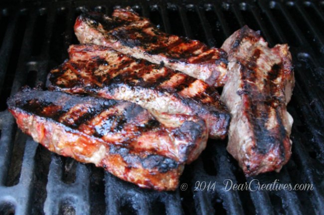 Steaks on a barbecue grill_