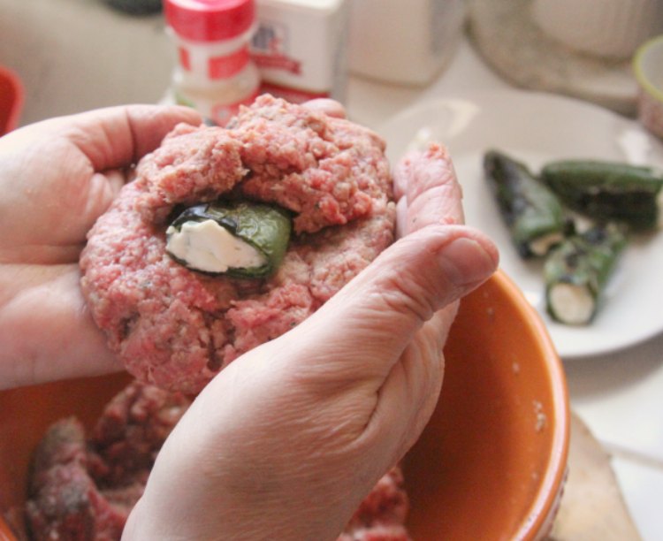Ground Beef Recipes Making a grilled stuffed cheeseburger by forming the patty around the stuffed jalapeno