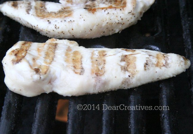 Chicken breast being grilled _2_