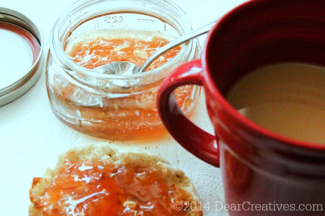 Cup of Coffee with jam and English muffin_