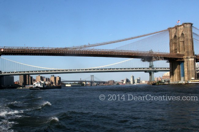 Water Way Shot of The Brooklyn Bridge_Manhattan Bridge and the Williamsburg Bridge in the distance New York City Hudson River_
