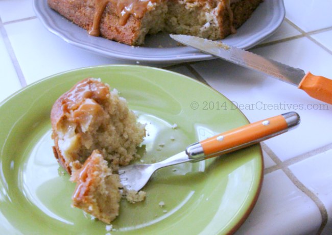 Cake on a plate and a slice of cake on a plate with fork_