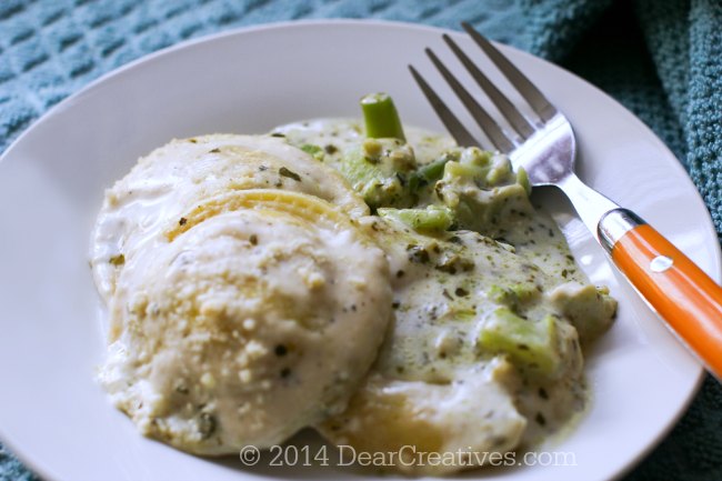 Dinner ready to be eaten with a Ravioli casserole with Alfredo sauce ...