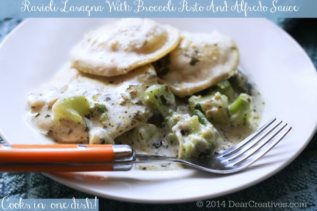 Ravioli Lasagna on a plate with a fork_ Ravioli Lasagna with broccoli Pesto and Alfredo Sauce_