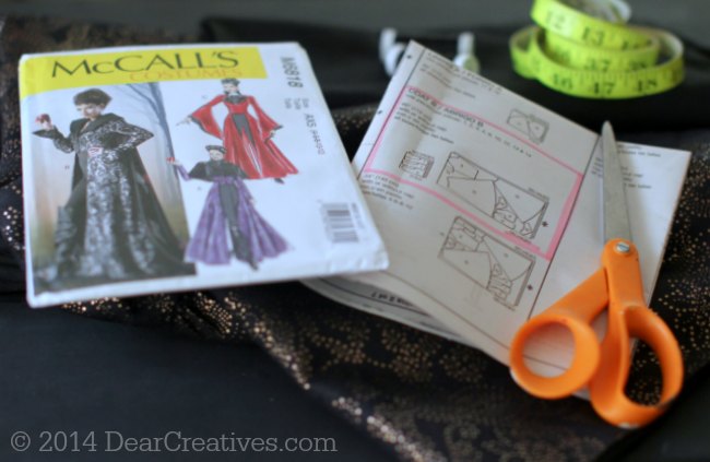 McCalls Costume Pattern, sewing scissors, notions and fabric_
