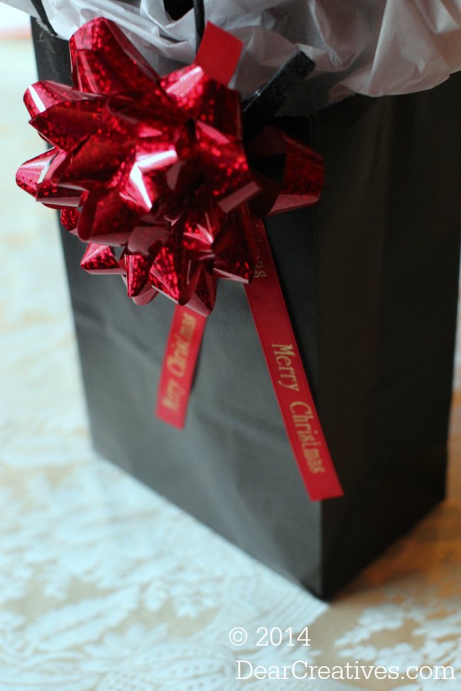 Holiday packaging_gift bag with bow and ribbon with a message_© 2014 DearCreatives.com