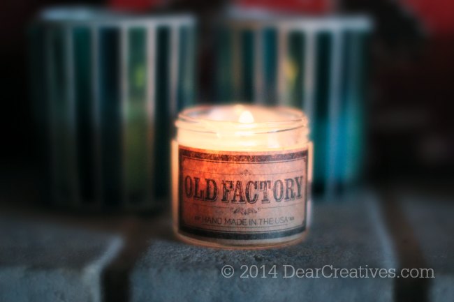 Old Factory Candle_candle burning on a mantle_© 2014 DearCreatives.com