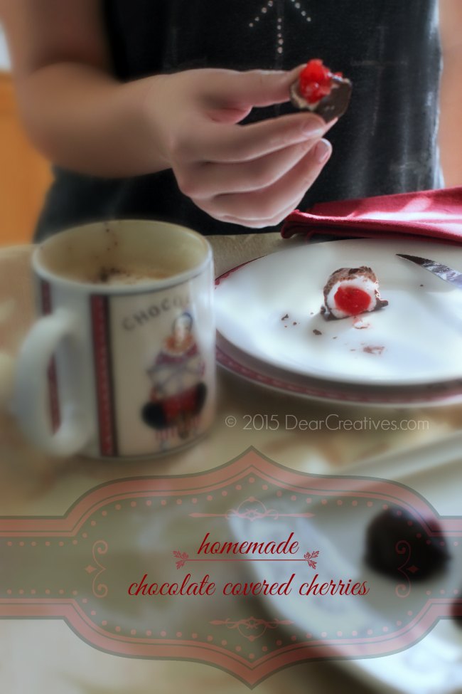 Homemade Chocolate Covered Cherries_ hand holding a half eaten chocolate covered cherry