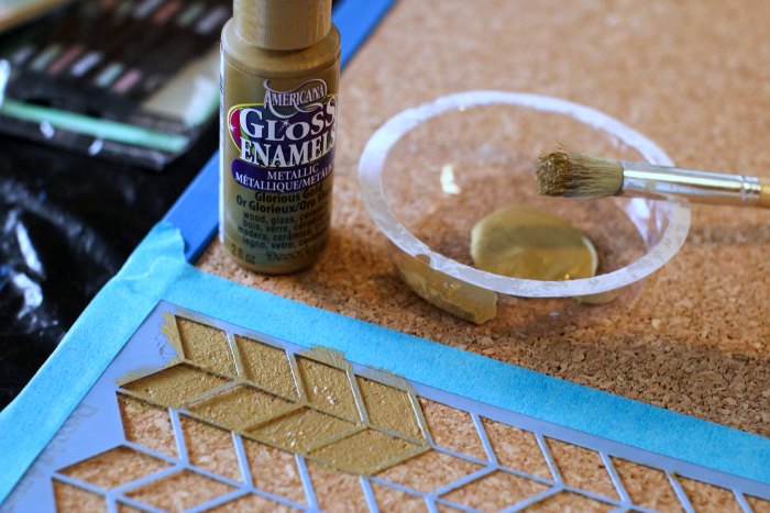 stenciling the cork on the bulletin board - close-up-of-stenciling-with-glorious-gold
