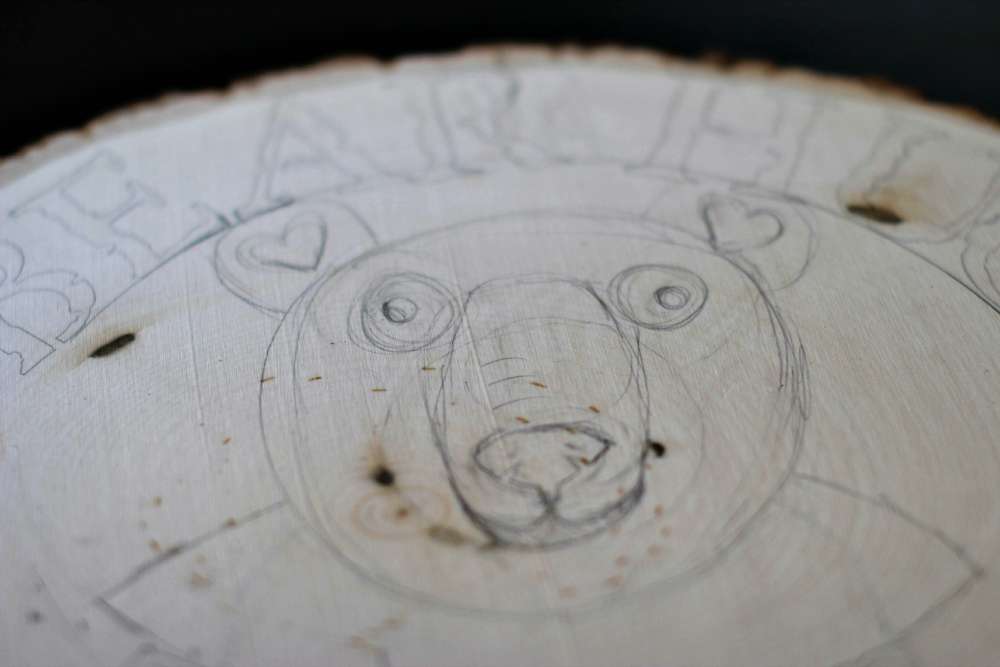 Pencil Draft Bear under Stenciled Lettering- how to create a bear plaque. Easy art and craft project for a wood round. DearCreatives.com