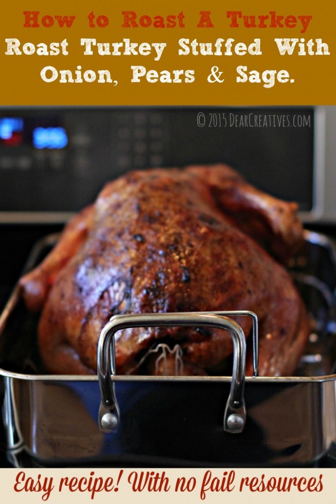Roast turkey With Onion Pears and Sage just being taken out of the oven still in the roasting pan