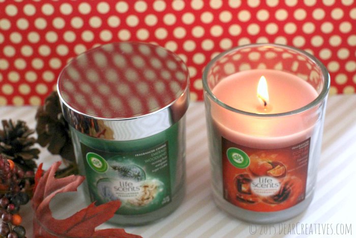 home-Two Air Wick Candles - A burning candle