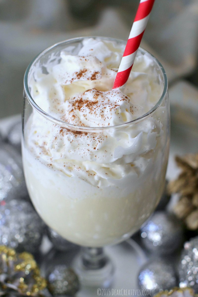 Drinks Eggnog with whip cream and cinnamon on top close up IMG_6603