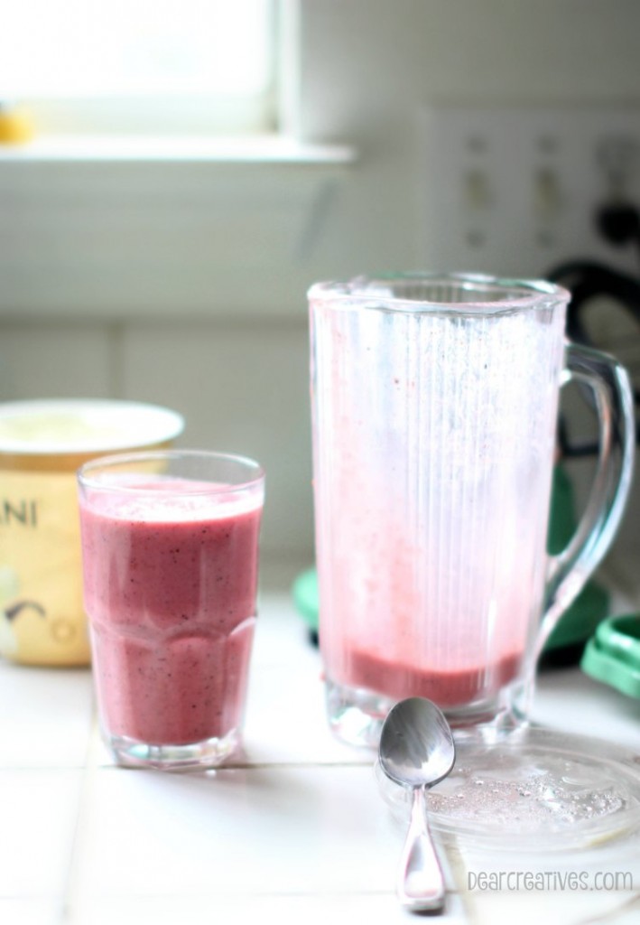 Drink Recipes |Berry Smoothie Recipe |Frozen Berries Close up in a glass for a smoothie recipeGlass Blender Close up With Juice insideIce and juice in a blender ready to be blended for a smoothie recipeBlended Smoothie Drink Recipe