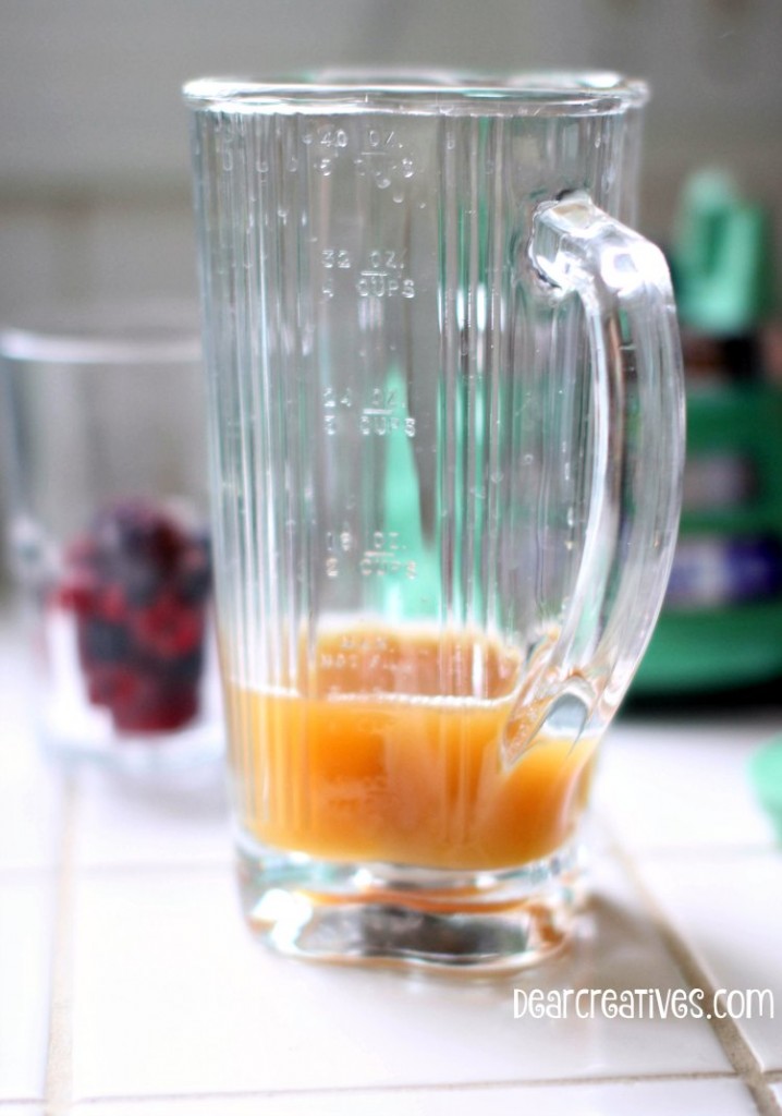 Drink Recipes |Berry Smoothie Recipe |Frozen Berries Close up in a glass for a smoothie recipe Glass Blender Close up With Juice inside
