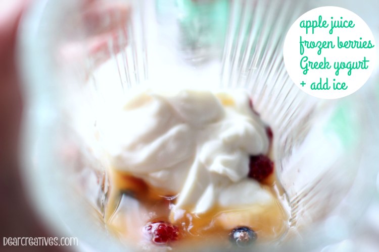  Drink Recipes |Berry Smoothie Recipe |Frozen Berries Close up in a glass for a smoothie recipeGlass Greek yogurt in a blender