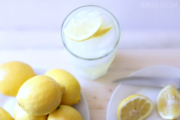 lemons and a glass of lemonade