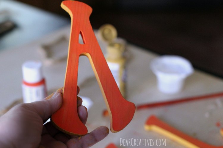 craft-project-fall-banner-with-wood-letters-close-up-of-two-tones-of-paint-on-wood-letters