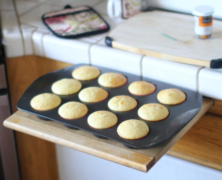baking cupcakes out of the oven cooling 