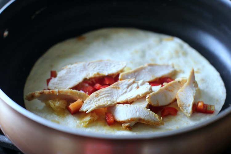 in the kithen- kitchen tools-cooking © 2017 Theresa Huse cooking a chicken quesadilla