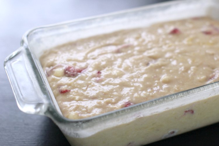 Strawberry Bread Recipe DearCreatives.com Strawberry Banana Bread Batter in a bread pan ready to be baked.