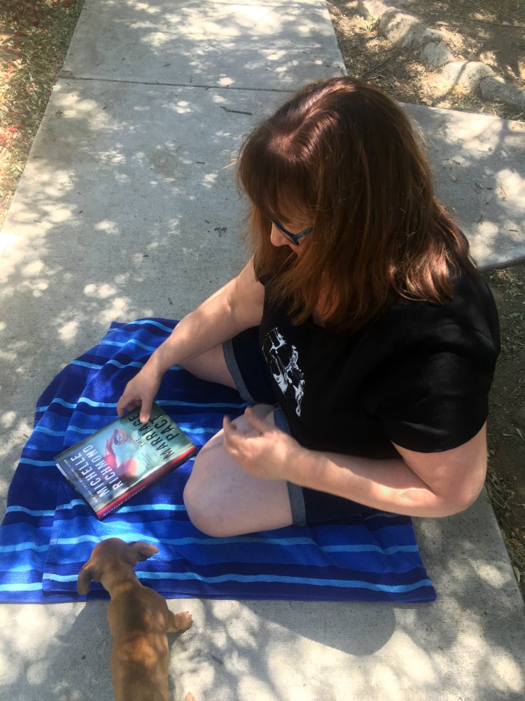 Reading a book outdoors 