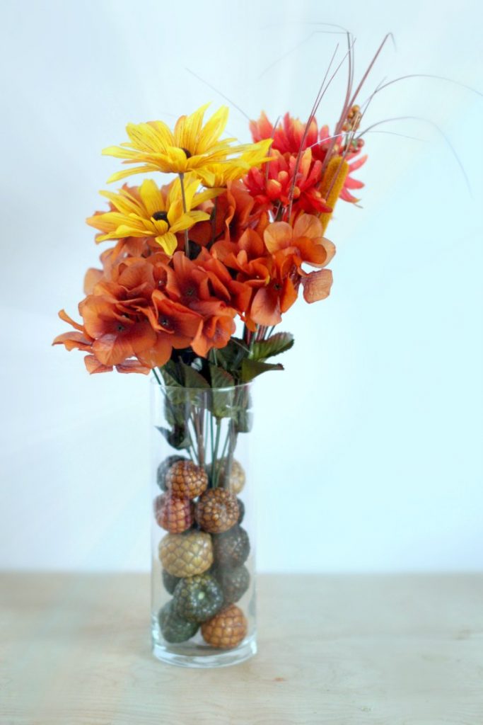 How to decorate a vase with filler and satin flowers Easy home decor ideas you'll love to make. See DIY at DearCreatives.com