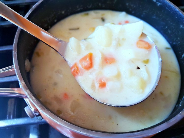 potato soup with carrots, celery, and spices. This is an easy 30 minute soup recipe. View or Print it at DearCreatives.com