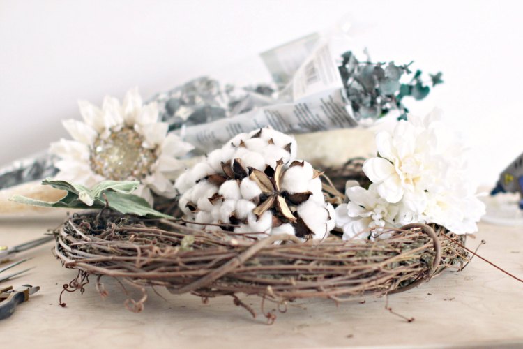 Farmhouse Wreath DIY supplies, grapevine wreath cotton bolls, silk flower, leaves, and tools. © 2017 Theresa Huse