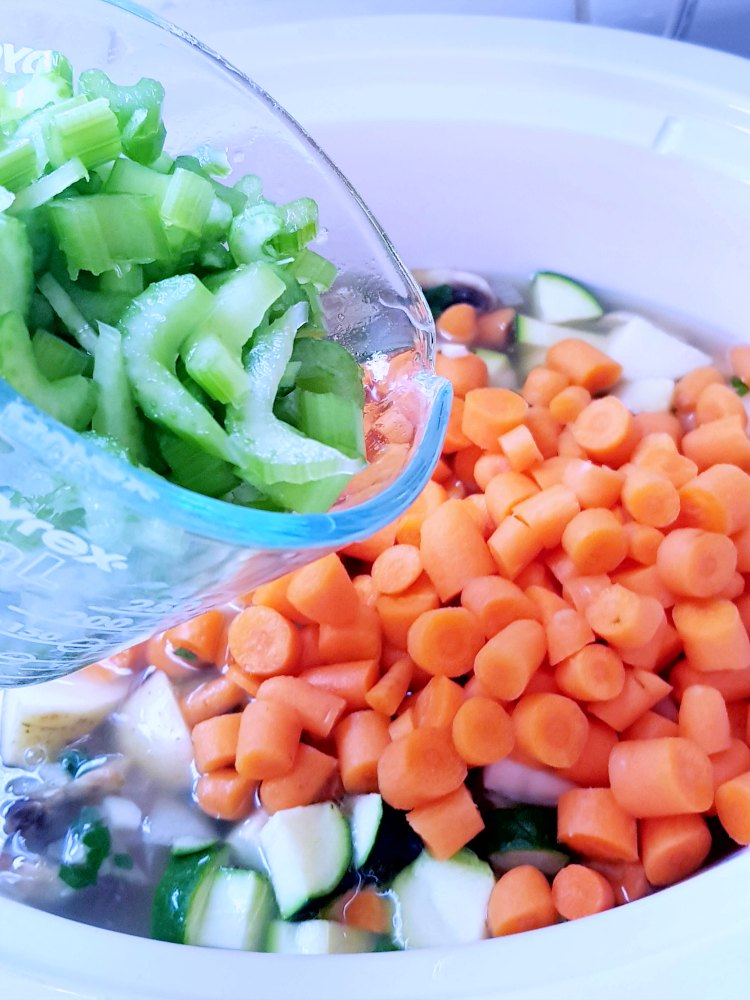 carrots, celery, zucchini in the crockpot for soup