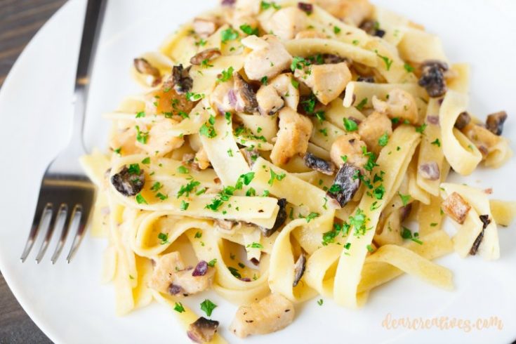 Pasta with chicken and mushroom on a plate