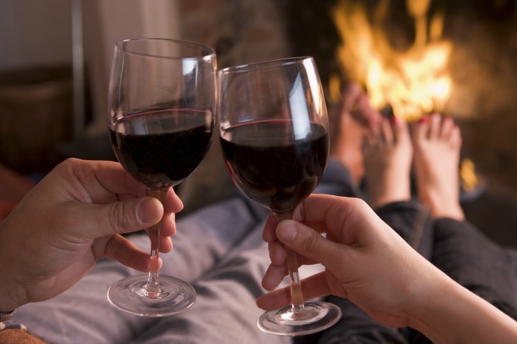 Valentine's Day ideas - having wine by the fire place