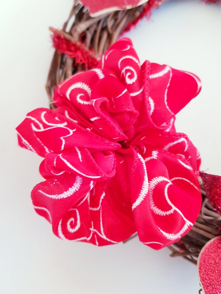 create a wired ribbon bow, and add it to the wreath