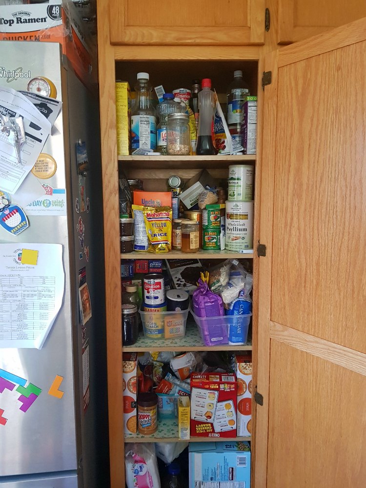 disorganized pantry in the kitchen