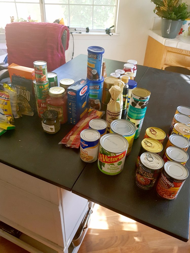 pantry staples on the kitchen island for organizing