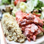 salmon dinner © 2017 Theresa Huse salmon on a plate with rice, lemon and salad