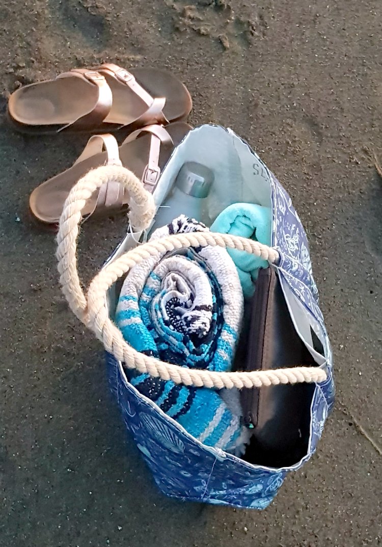 sandals and an eco-friendly beach bag