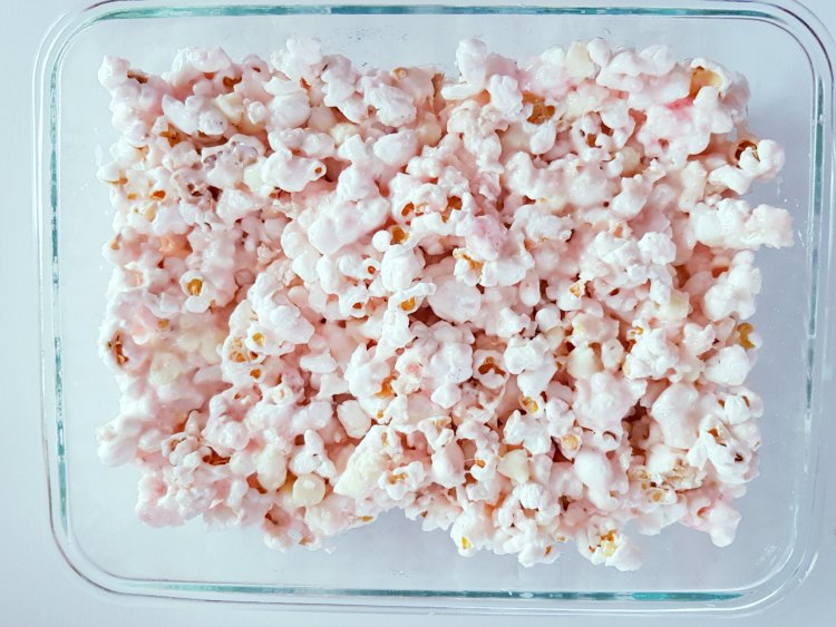 marshmallow coated popcorn for a popcorn bars treat. DearCreatives.com