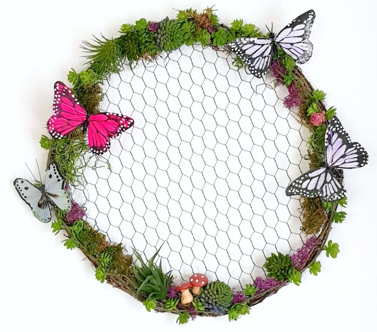nature inspired wreath with succulents, and butterflies on a grapevine wreath with chicken wire. home decor ideas © 2018 Theresa Huse -DearCreatives.com