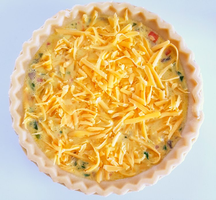 cheese quiche ready to be baked in the oven © DearCreatives.com