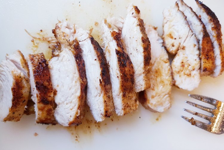 Cooked sliced boneless chicken breast for chicken salad. DearCreatives.com