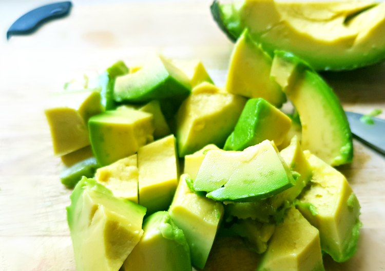 Diced avocados for a healthy breakfast recipe. DearCreatives.com