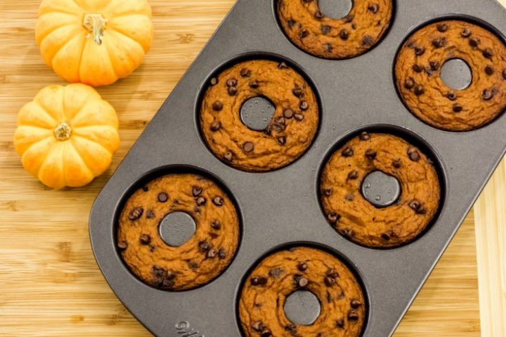 Pumpkin Chocolate Chip donuts in a pan. Recipe at DearCreatives.com